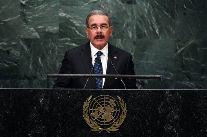 Dominican Republic's President Danilo Medina Sánchez addresses the 71st session of the United Nations General Assembly at the UN headquarters in New York on September 21, 2016.   / AFP / Jewel SAMAD