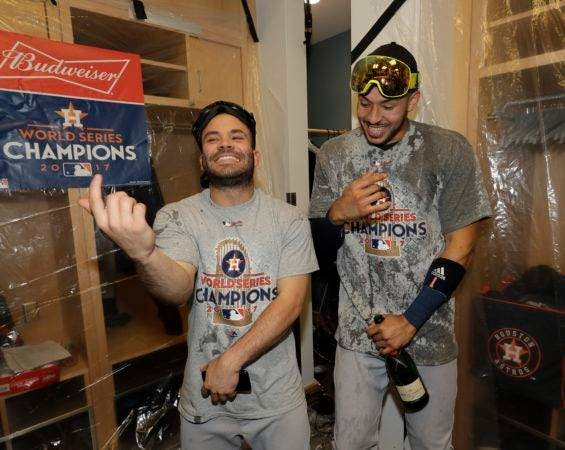 José Altuve y Carlos Correa de los Astros de Houston.