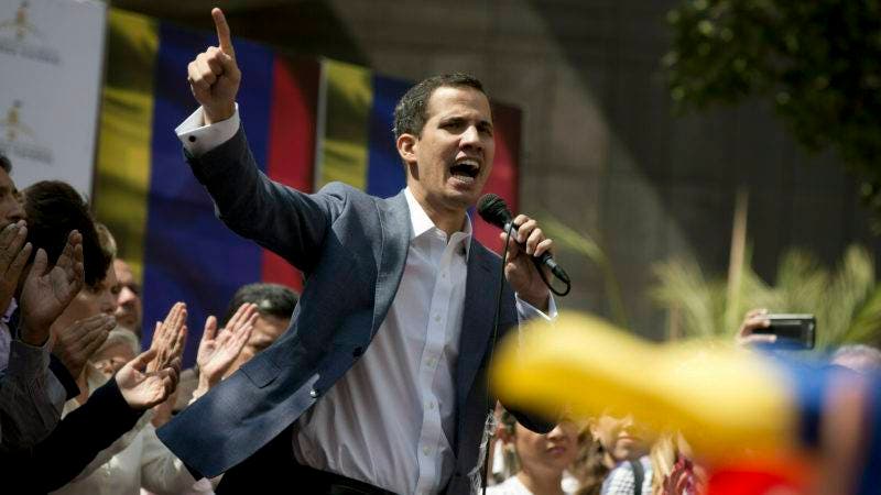 FILE - In this Jan. 11, 2019 file photo, Juan Guaido, president of the Venezuelan National Assembly, delivers a speech during a public legislative session in Caracas, Venezuela. The head of Venezuela's opposition-run congress declared himself president of Venezuela on Wednesday, Jan. 23, 2019. A Trump administration official and a U.S. congressional aide say U.S. President Donald Trump plans to recognize Guaido as the interim president of the crisis-mired South American country. (AP Photo/Fernando Llano, File)