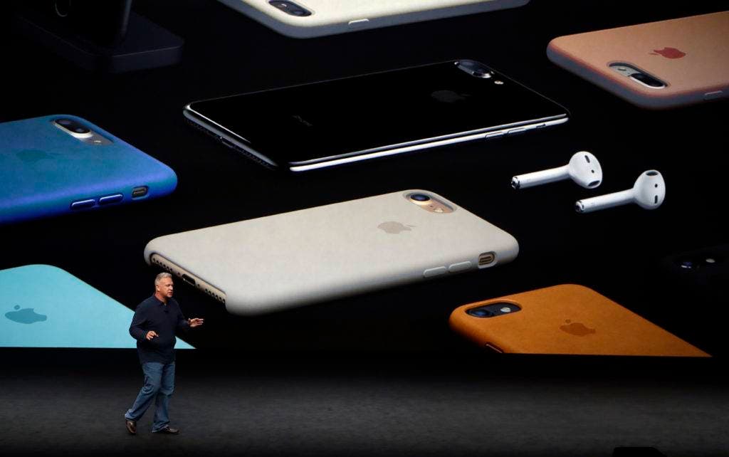 Phil Schiller, Apple's senior vice president of worldwide marketing, talks about the pricing on the new iPhone 7 during an event to announce new products Wednesday, Sept. 7, 2016, in San Francisco. (AP Photo/Marcio Jose Sanchez)