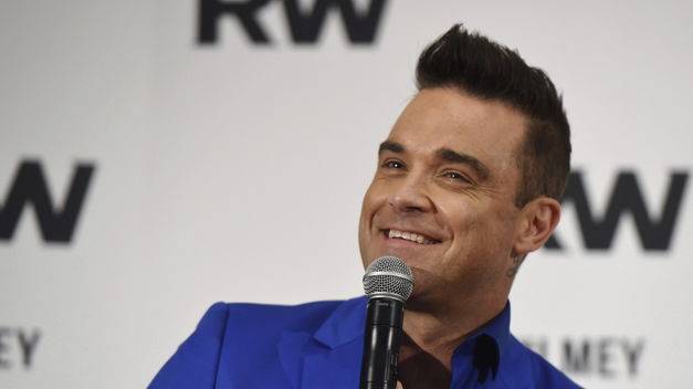 Robbie Williams: “Me volví un neurótico con mi lugar en las listas de ventas»