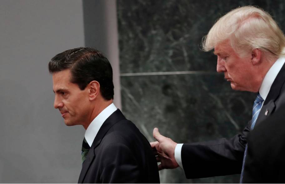 Trump y Peña Nieto buscan reducir tensión bilateral