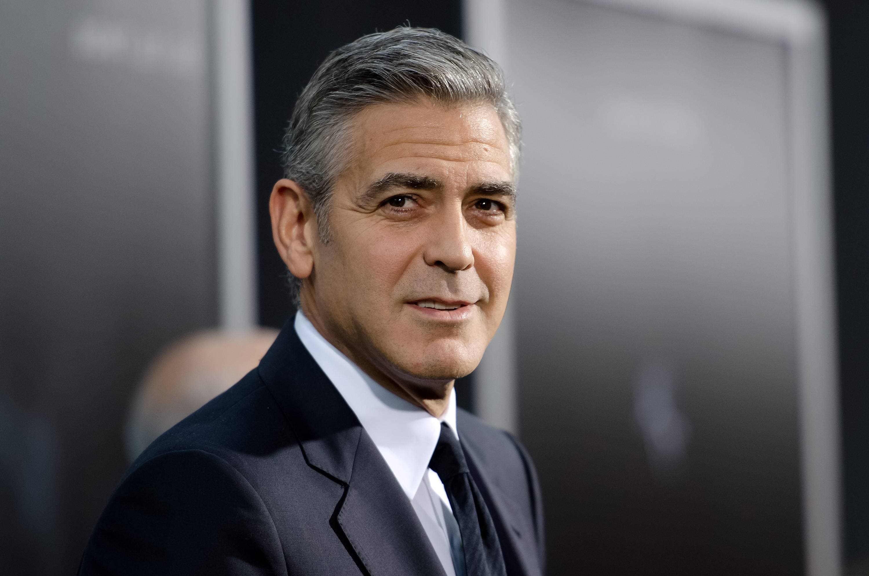 Clooney amenaza con tomar medidas por fotos de sus mellizos