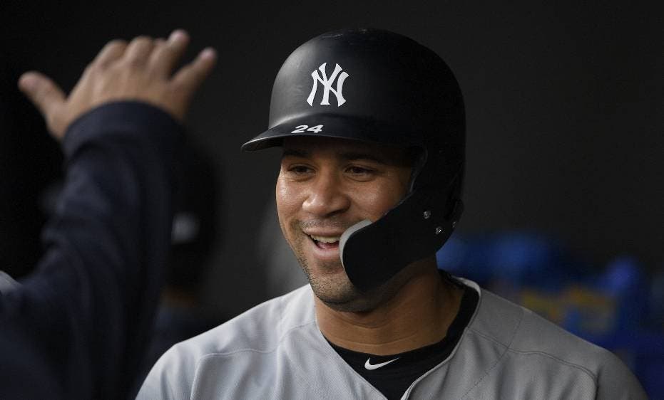 New York Yankees' Gary Sanchez smiles in the dugout after his three-run home run during the first inning of the team's baseball game against the Baltimore Orioles, Tuesday, May 21, 2019, in Baltimore. (AP Photo/Nick Wass)