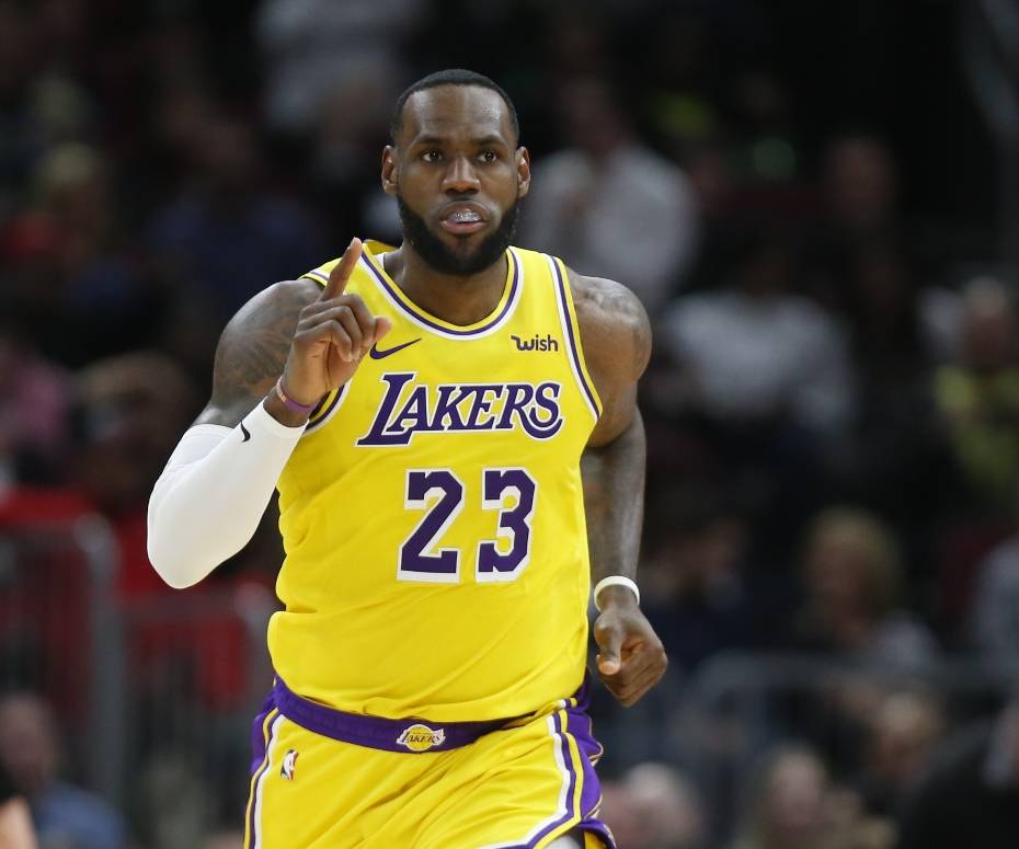 Los Angeles Lakers forward LeBron James gestures after making a basket against the Chicago Bulls during the second half of an NBA basketball game Tuesday, March 12, 2019, in Chicago. (AP Photo/Nuccio DiNuzzo)