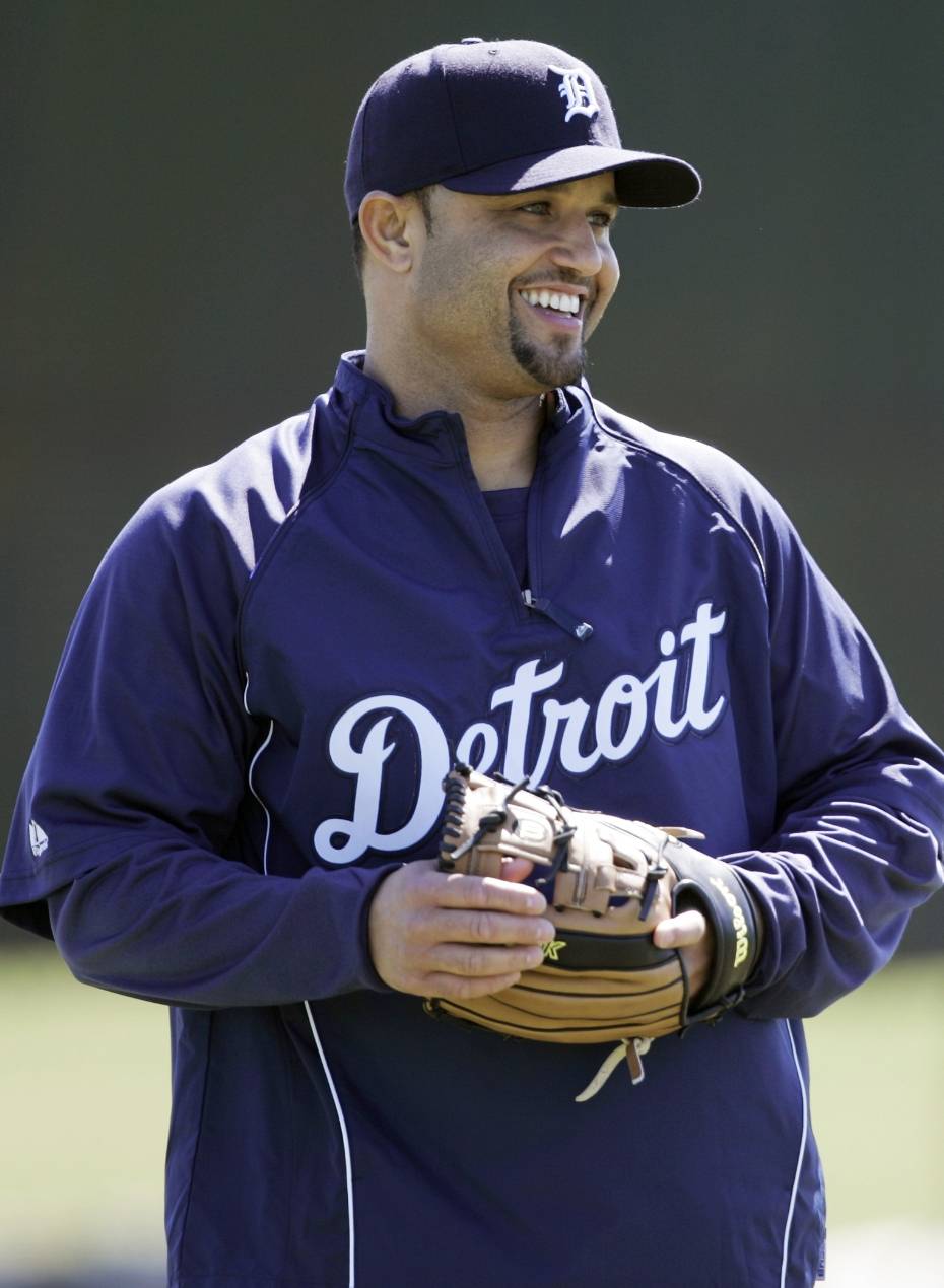 Detroit Tigers second baseman Placido Polanco smiles as he takes the field at spring training baseball Tuesday, Feb. 19, 2008, in Lakeland, Fla. (AP Photo/Duane Burleson)