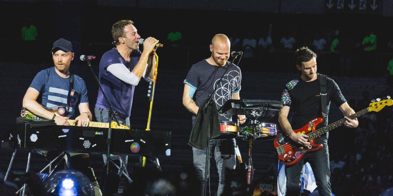 Coldplay hace tributo RD con “Bachata Rosa” | Wisin y Yandel en concierto