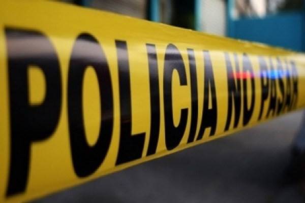 Tres muertos a tiros en atraco y en punto de drogas en Santiago