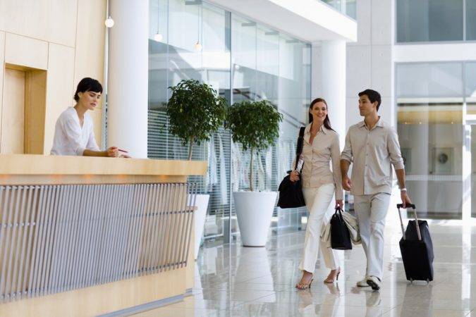 Man and lady arriving at hotel 1