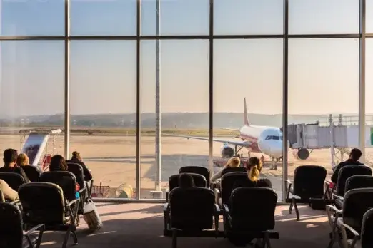 depositphotos 62827713 stock photo passengers waiting on the airport