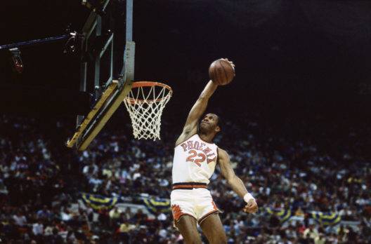 515323096 basketball player larry nance playing hard for the net