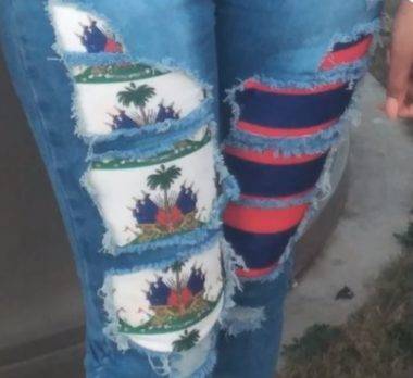 Fotos: Miembro grupo reeleccionista viste pantalón con bandera de Haití